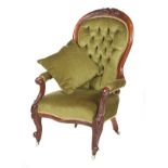 A VICTORIAN WALNUT GENTLEMANS OPEN ARMCHAIR With carved and shaped frame A VICTORIAN WALNUT