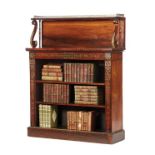 A GOOD REGENCY ROSEWOOD OPEN BOOKCASE, CIRCA 1830 The raised shelf with... A GOOD REGENCY ROSEWOOD