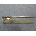 Bayonet: U.S. P.17 by Remington. In its steel mounted leather scabbard with belt clip. Sound