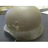 German WW2 Luftwaffe double decal battle damaged helmet with two bullet holes strait through it