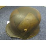 Helmet: a WW1 Model 1916 Imperial German Infantry helmet. Camouflage painted finish. Three pad