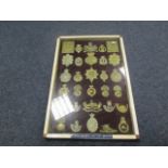 Military badges - mixed old collection in frame including pouch plates, hat badges, etc. May contain