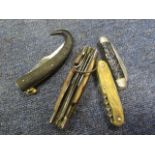 Knives: An old multi function horn handled clasp knife (scissors, saw, bottle opener, blades), a