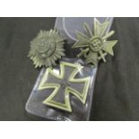 German WW2 Iron Cross 1st class, (horizontal pin) War Merit Cross with swords 1st maker marked 24,