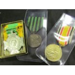 Foreign medals an early Dutch Campaign Cross in original box, a French 1870-71 War medal, Imperial