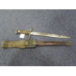 Bayonet: Italian WW2 M-87/91/15 knife bayonet in its steel mounted fluted, leather scabbard. Blade