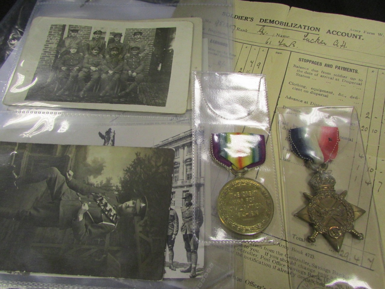 1914-15 Star and Victory medals with an assortment of picture postcards relating to the recipient in