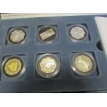 The Masterpiece Millennium Collection 2000 a 24 coin set with one Silver Crown-sized example from