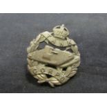 Badge a WW1 Tank Corps Officers cap badge, maker marked.  GVF