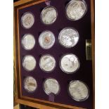 Queen Elizabeth II Golden Jubilee Collection a 24 coin set of Silver Crown sized coins from around