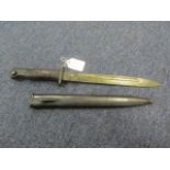 Bayonet: Siamese Model 1896 Mauser knife bayonet. Grip with oval rivets denoting manufacture by