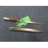 Bayonet: Egyptian F.N. Model 1949 short export Mauser bayonet. Grip has been (well) replaced.