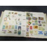 All World lot in a crammed Swiftsure Stamp Album (qty)