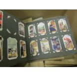 Box of various old cigarette cards loose in albums and stuck in (no reserve) buyer collects