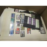 GB - large box of mostly UM Commemorative and Definitives sets and odds, in stockbooks, packets,