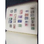 New Age Stamp Album of British Commonwealth QE2 material, clean mounted mint lot (qty)