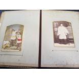 Chiselled leather Victorian photo album of some quality containing a selection of cabinet cards