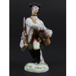 Meissen Figure of a soldier standing , approx 8cm high
