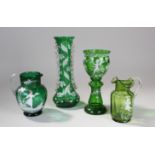 Mary Gregory style enamel glass, to include two vases and two jugs, tallest 32cm, (4)