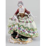 Sevres hand painted porcelain figure of a lady, Has a novelty hole in its base allowing a view up