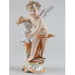 Volkstedt porcelain figure of a cherub sculpturing, height approx 14.5cm