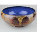 Royal Doulton Stoneware bowl, blue interior with the outside having a pattern of autumn leaves,