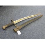 Bayonet: A British Pattern 1856/8 Volunteer sword bayonet, pommel marked 'V-GM A3-402' to a