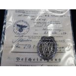 German dvl sports badge in silver with award document