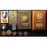 Athletics Memorabilia, a collection of 9 Official and 'Presse' medals and plaques belonging to Joe