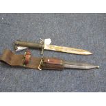 Bayonet: A good Swedish Model 1898 knife bayonet in its steel scabbard with original leather frog.