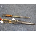 Bayonet: German Model 1884/98 knife bayonet with wooden grips, in its steel scabbard with frog and