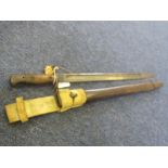 Bayonet: German Model 1898 NCOS bayonet 1st pattern with one piece wrap around grips in its steel