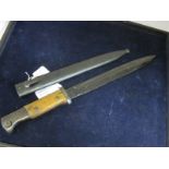 Bayonet: German 3rd Reich Pattern 1884/98 knife bayonet. Ricasso marked 'P.R.8' Blued scabbard and