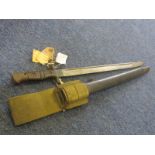 Bayonet: A U.S. P'17 Bayonet in its steel mounted leather scabbard with webbing frog for Home