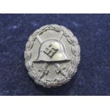 German black wounds badge 1936 early type with WW1 pattern tin helmet , GVF