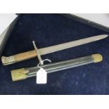 Bayonet: Italian Carcano Model 1891 knife bayonet in its steel mounted leather scabbard (undated).