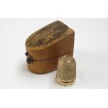 Mauchline ware thimble case with Ventnor from East script and with a 9ct gold thimble by Albert