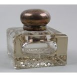 Edwardian cut glass inkwell with hallmarked silver lid. Hallmarks for chester 1914 makers mark