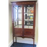 Edwardian mahogany satinwood inlaid display cabinet, the moulded cornice above a frieze with