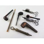Mixed lot of antique pipes including one with silver collar, one Irish bog oak and two in burr