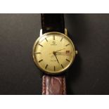Gents 9ct gold Omega Geneve automatic wristwatch circa 1960s, with date at 3 o'clock. On a brown
