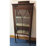 Circa 1900 Art Nouveau display cabinet with single glazed door and shelves