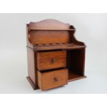 Edwardian Oak smokers cabinet with two drawers and a pipe rack above