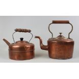 A pair of 19th century copper kettles with brass fitments