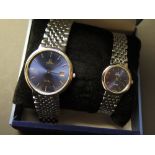 A "His and Hers" set of Omega Deville wristwatches both stainless steel with a brick effect