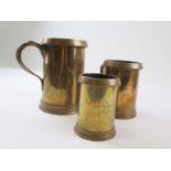Set of three heavy brass early 19th century measures of a quart, a pint and a half pint