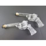 Pair of 1970's vintage glass sherry bottles in the shape of guns