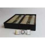 A collection of early 20th century glass microscope slides (approx 70) by Flatters & Garnett Ltd