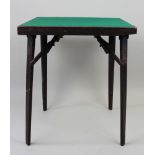 Early 20th century folding card table with a green baize top and collapsable legs