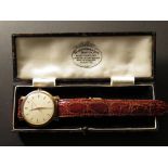 An 18ct Gold International Watch Company Schaffhausen Wristwatch on a leather strap